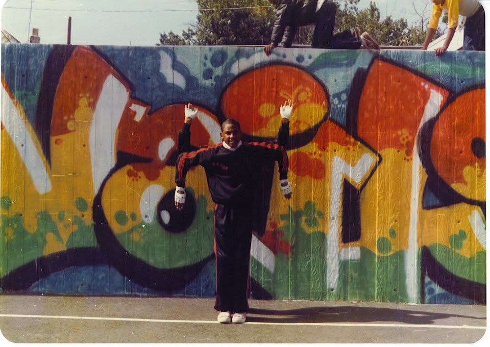 Basil Harris archive photo 21: 1980s — Basil at graffiti wall